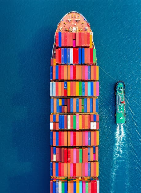 Top view of cargo ship with containers